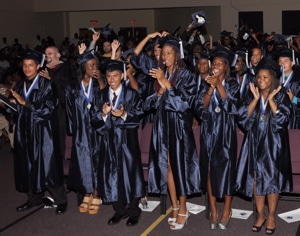 GRADUATION BRINGS SMILES AND TEARS